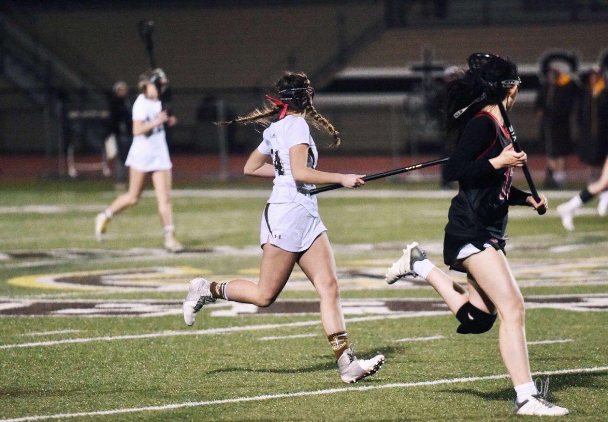 Varsity Girls’ Lacrosse Team wins on and off the field