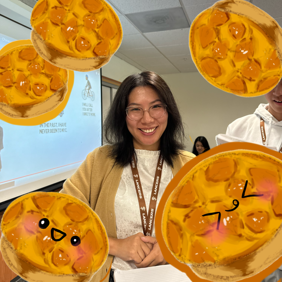 Ms. Zhang surrounded by cute pineapple buns. 