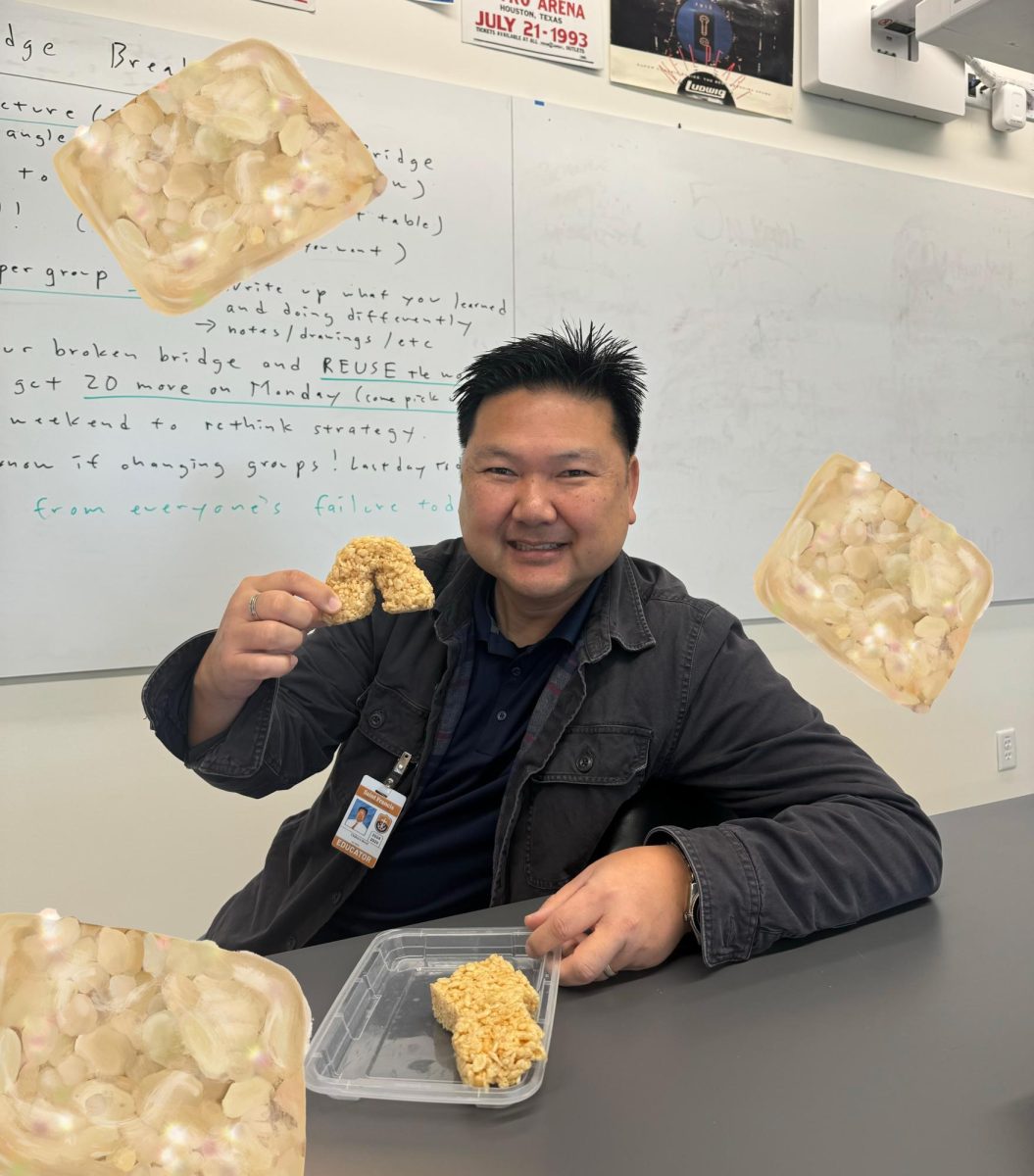 Mr. Ikezi poses with his Rice Krispies treat.