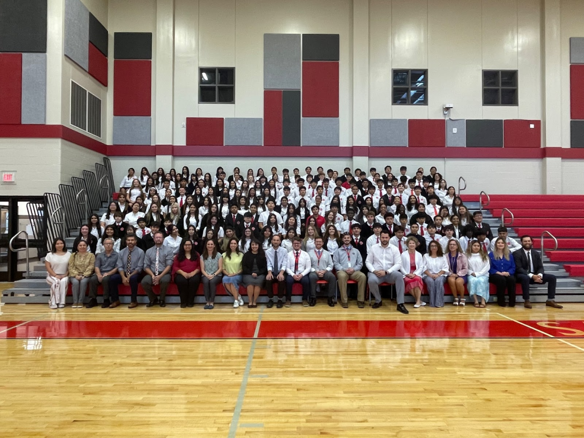 San Juan Diego's students and staff pose for a photo.