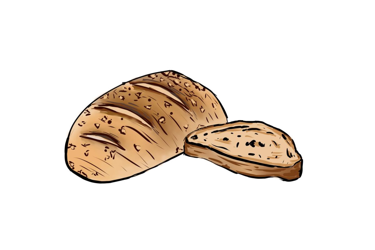 A loaf of sourdough bread waits to be eaten.
