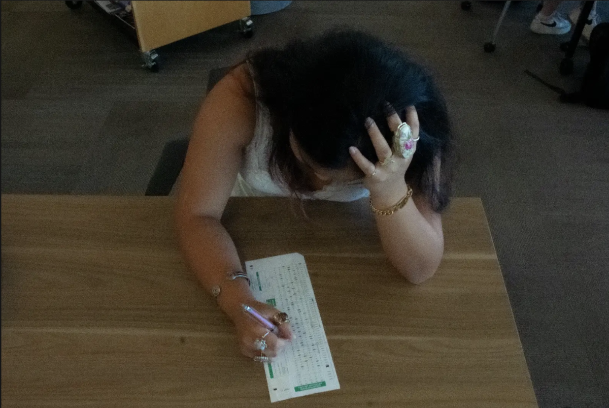 Christine Gatus ('27) stresses over a scantron.